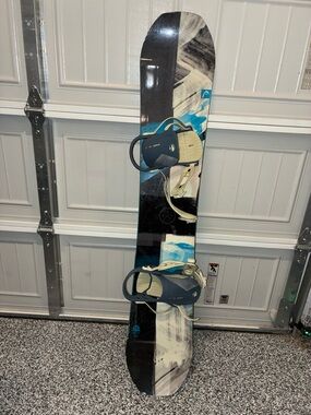 Head Blue and Black Snowboard with Blue Bindings